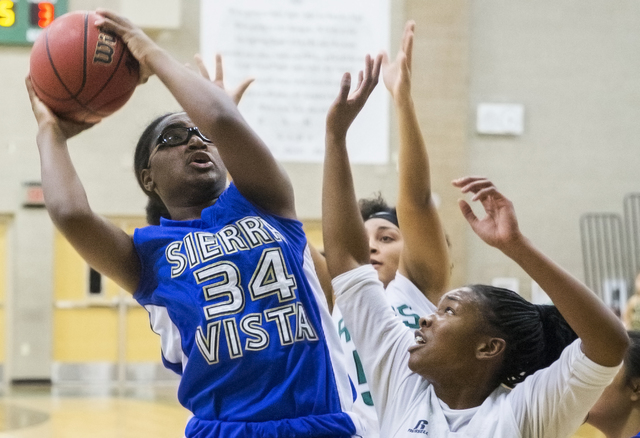 Sierra Vista’s Shania Harper (34) shoots over Rancho’s Alesse Hall (21) during t ...