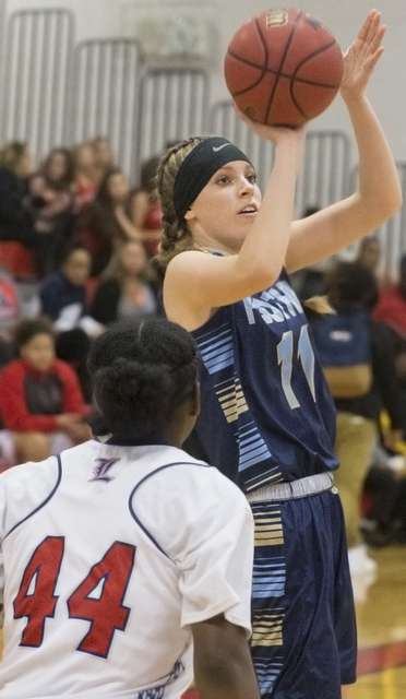 Foothill’s Kylie Vint (11) shoots a jump shot over Liberty’s Liberty’s Dre ...