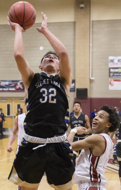 Sierra Vista’s Maka Ellis (32) shoot over a Desert Oasis’ defender on Tuesday, D ...