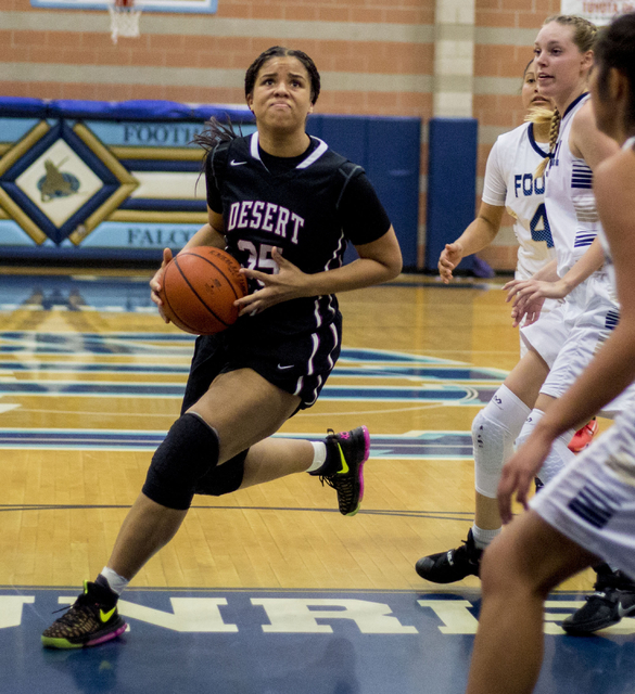 Desert Oasis’ Dajaah Lightfoot, (35), prepares to shoot a basket during a game against ...