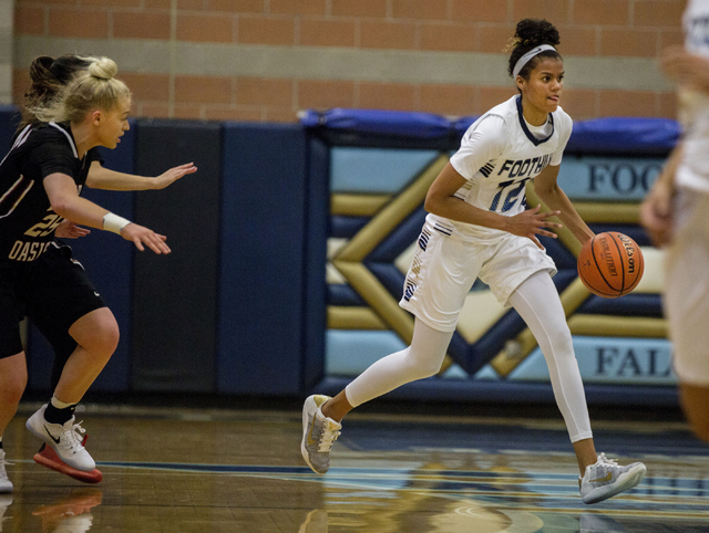 Foothill’s Rae Burrell, (12), dribbles the ball during a game against Desert Oasis at ...
