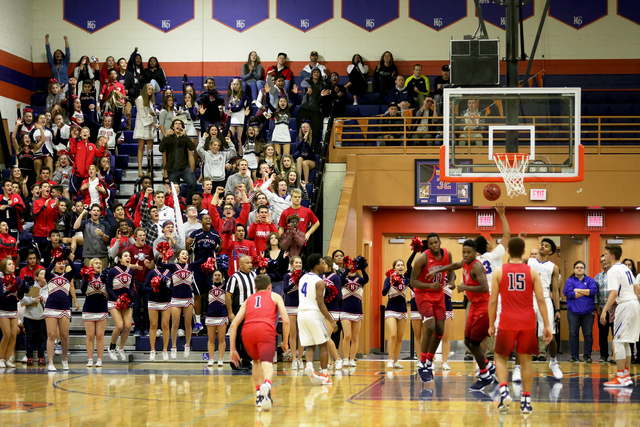 The crowd cheers for Coronado after they scored during a basketball game at Bishop Gorman Hi ...