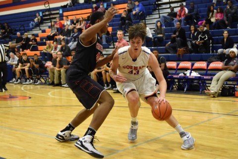 Bishop Gorman’s Stephen Zimmerman (33) dribbles past Corona Centennial’s Ike Ani ...