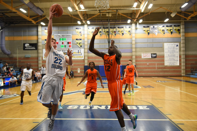Foothill’s Jeron Bodin (22) goes up for a shot against National Prep Academy’s A ...