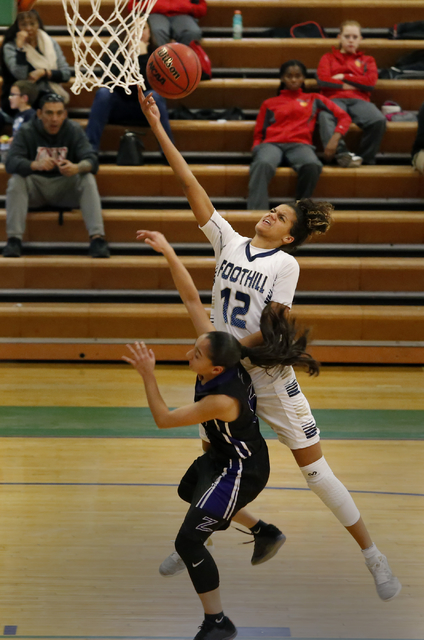 Foothill’s Rae Burrell shoots a layup over Durango’s Esmeralda Buenrostro during ...