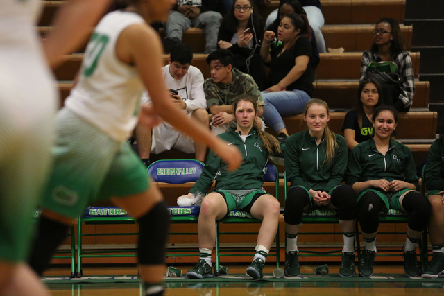 Green Valley Gators players watch their team from the bench during a game against Coronado C ...