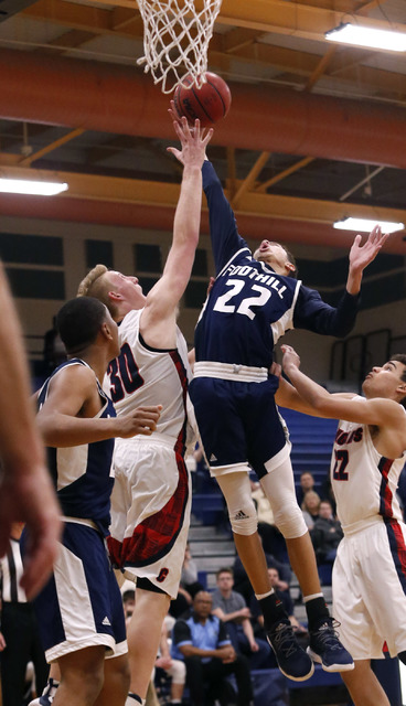 Foothill’s Jace Roquemore (22) shoots a layup against Coronado’s Kennedy Koehler ...