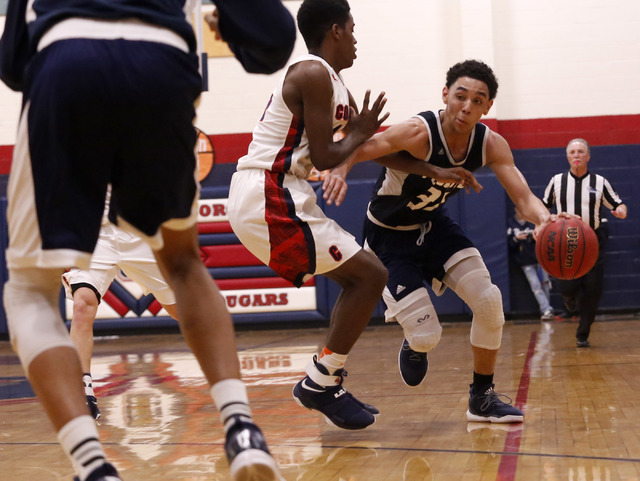 Foothill’s Marvin Coleman (31) drives down the court during the second half of a high ...