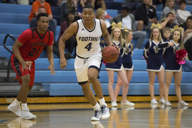 Foothill senior Mauricio Smith brings the ball up the court at Foothill High School on Tuesd ...