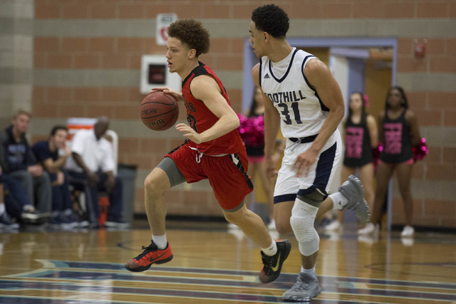 Las Vegas senior Jason Cullen drives the ball up the court at Foothill High School on Tuesda ...