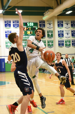 Green Valley’s Xavier Jarvis (4) shoots the ball against Coronado’s Nick Korniec ...