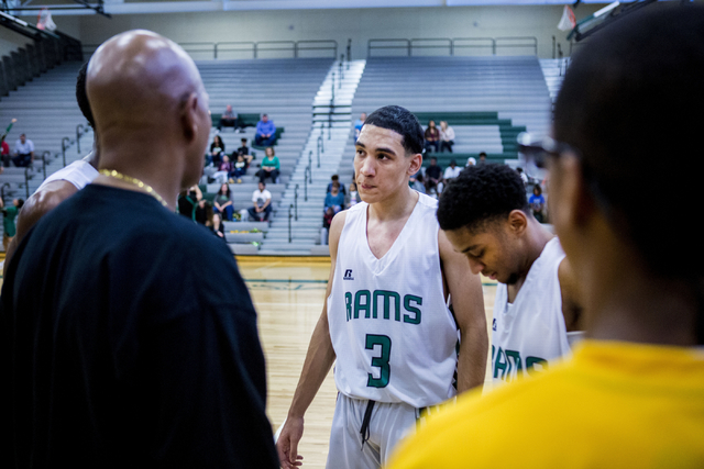 Rancho Rams Guard Chrys Jackson, 3, listens during a timeout during a game against Agassi Pr ...