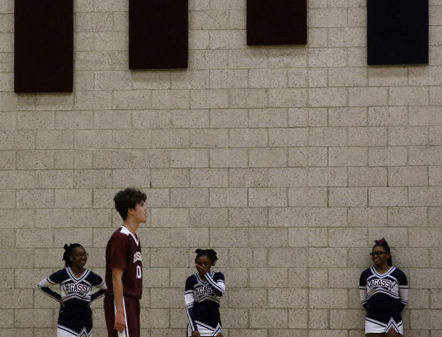 Agassi Prep cheerleaders react during a boys basketball game against Innovations Internation ...