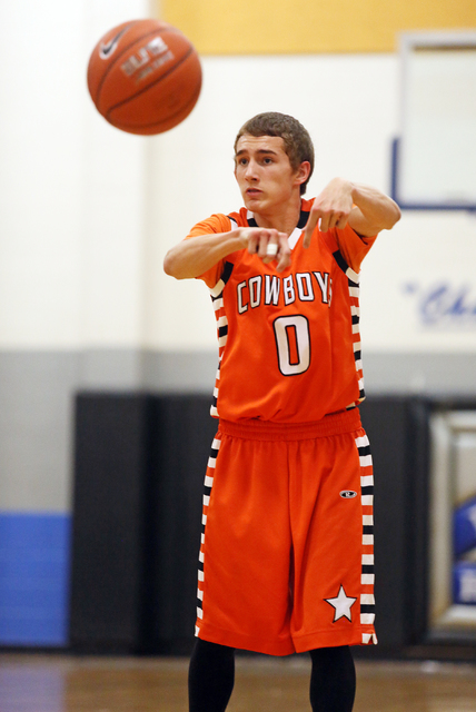 Chaparral’s Samuel Porras passes the ball during a basketball game against Desert Pine ...