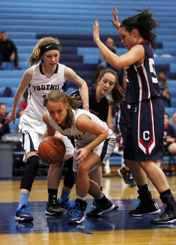 Foothill’s Mikayla Yeakel, front, gets possession of a loose ball on Thursdya against ...