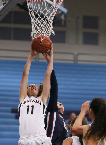 Foothill’s Kylie Vint, left, and Coronado’s Anastaysa Youmans go for a rebound o ...