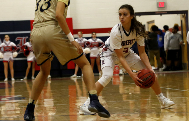 Liberty’s Celine Quintino (3) looks for a pass against Spring Valley’s Alexus Qu ...