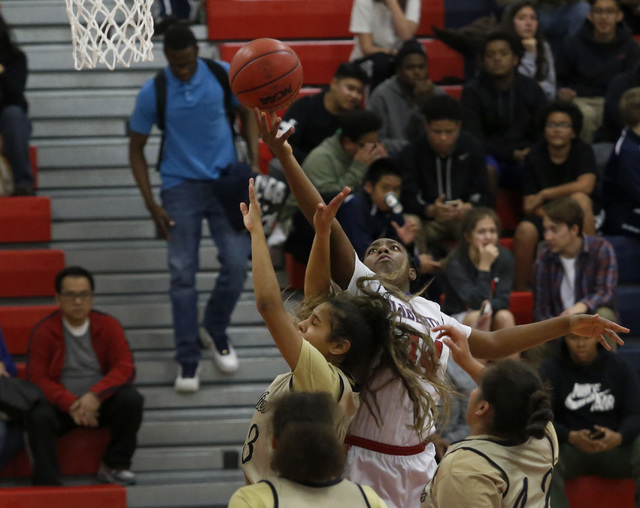 Liberty’s Dre’una Edwards (44) shoots a layup during a girls basketball game on ...