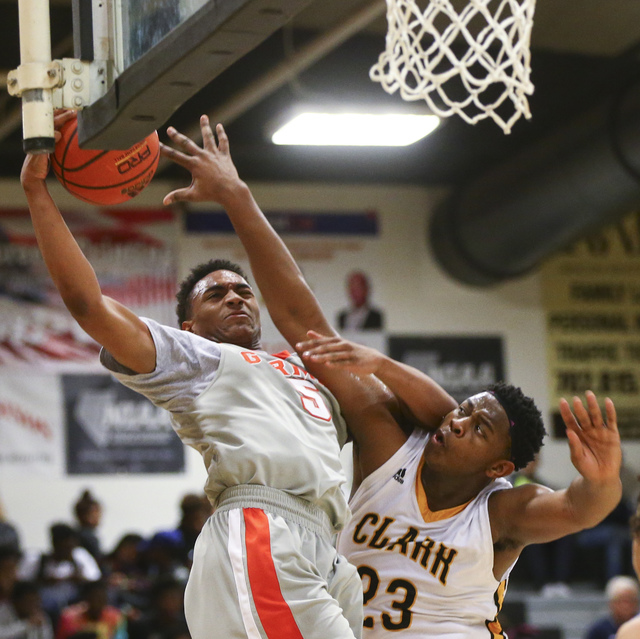 Bishop Gorman’s Chuck O’Bannon (5) goes up for a shot against Clark’s Antw ...