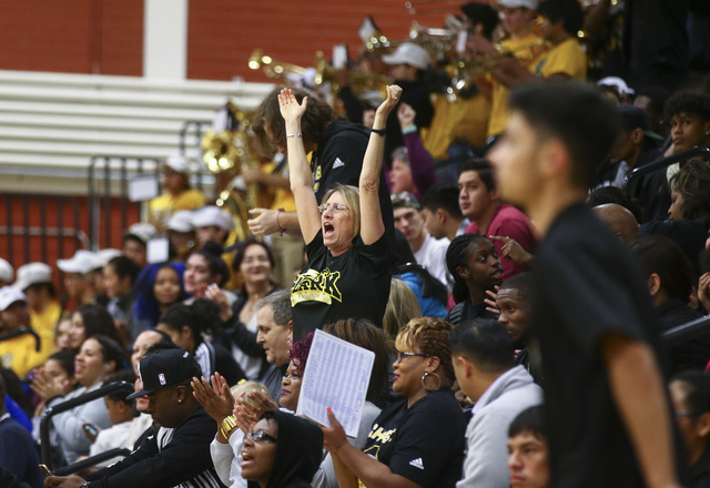 Clark fans cheer as their team plays Bishop Gorman during a basketball game at Clark High Sc ...