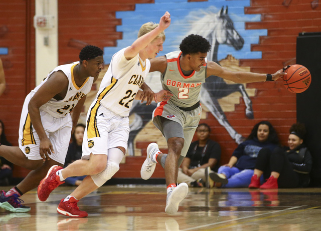 Bishop Gorman’s Jamal Bey (2) gets control over the ball against Clark’s Trey Wo ...