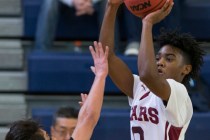 Agassi Prep’s Akeemis Williams (0) takes a shot against Mountain View in the boy&#8217 ...