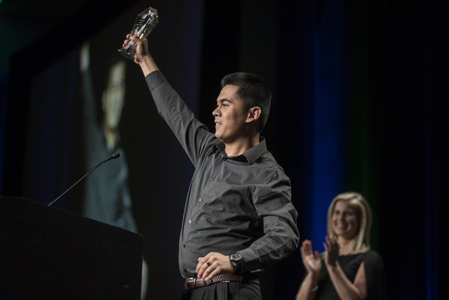 Desert Oasis student Ron Chan shows emotion after winning the No Limit award during the inau ...