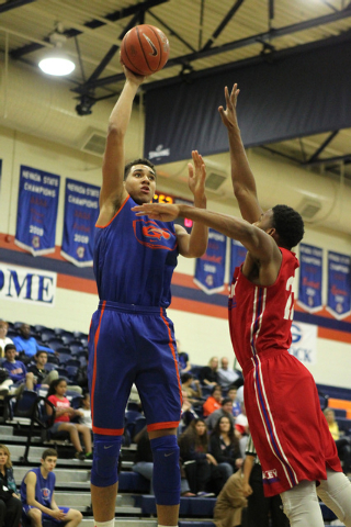Bishop Gorman’s Chase Jeter (4) goes up for a shot during a scrimmage against Valley o ...