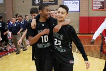Palo Verde guards Ja Morgan, left, and Taylor Miller celebrate defeating Centennial 75-72 in ...