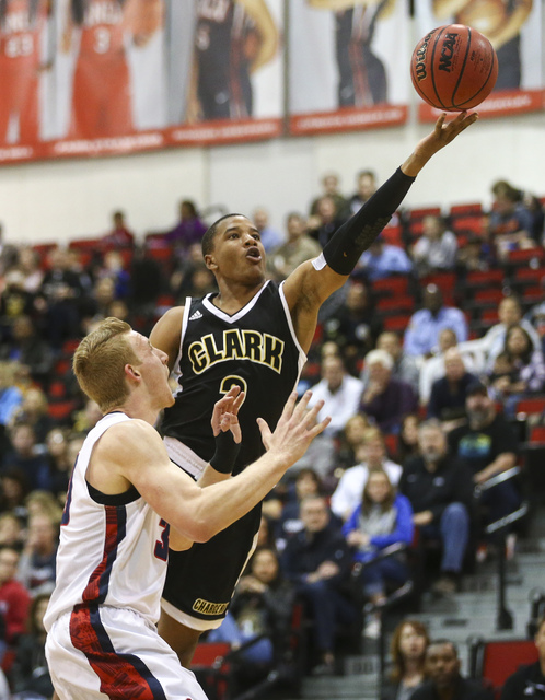 Clark guard Sedrick Hammond (2) shoots over Coronado’s Kennedy Koehler (30) during the ...