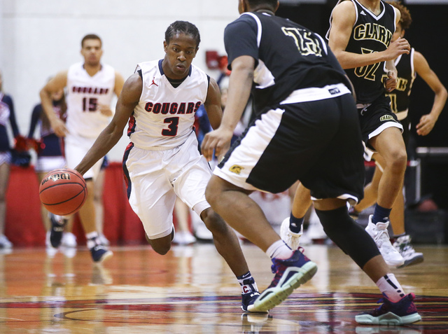 Coronado’s Nick Davis (3) drives against Clark during the Class 4A boys state basketba ...