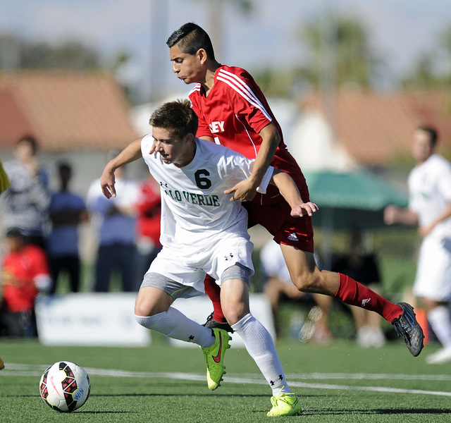 Valley midfielder John Cerda challenges Palo Verde midfielder Connor Ryan (6) during the Div ...