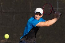 Coronado’s Martin Rizov plays a tennis game against Silverado’s Seth Forstner du ...