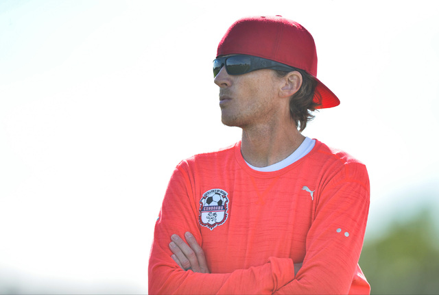 Coronado head coach Dustin Barton walks the sideline during the boys Class 4A State Champion ...