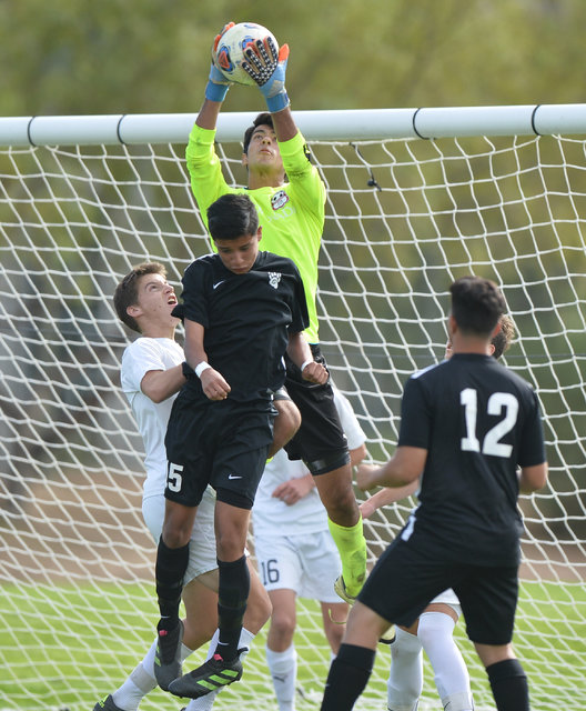 Coronado goalie Harrison Skinner (1) stops a corner kick during the boys Class 4A State Cham ...