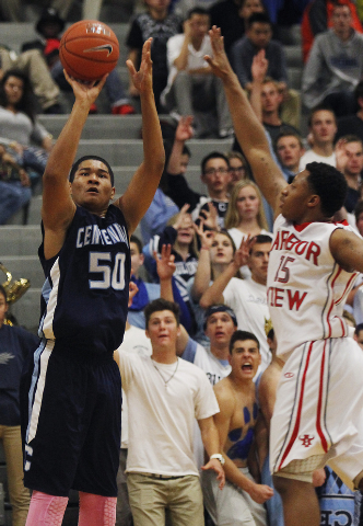 Centennial’s Eddie Davis (50) hits a 3-pointer in front of Arbor View’s Charles ...