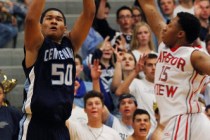 Centennial’s Eddie Davis (50) hits a 3-pointer in front of Arbor View’s Charles ...