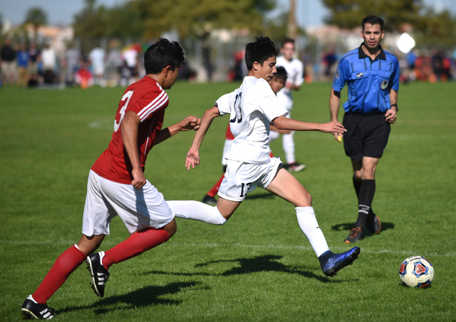 Coronado’s Alfredo Diaz (13) kicks the ball against Valley during the Sunrise region b ...