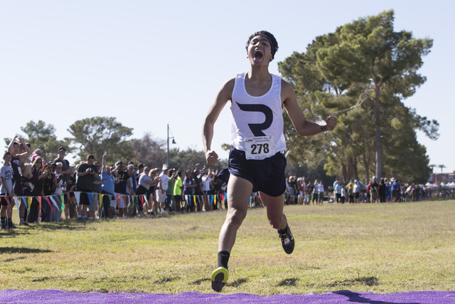 Anthony Ocegueda finishes first during the boys 4A NIAA State Championship meet at Craig Ran ...