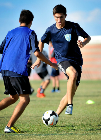 Foothill forward Robert Cowan, right, looks to get around defender Zeke Garcia during a rece ...