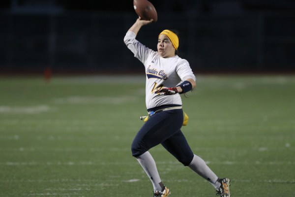Boulder City quarterback Jeanne Carmell (14) throws a pass for an extra point during their f ...