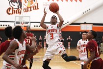 Chaparral guard Marc Silas drives to the basket against Del Sol on Thursday. Silas scored 29 ...