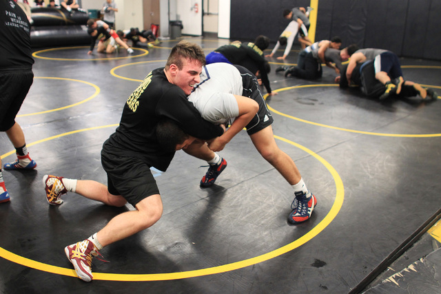 Clark wrestler Jacob Chaparian works out with Edwin Centeno in practice on Tuesday. Chaparia ...