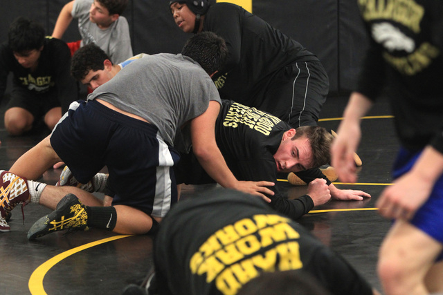 Clark wrestler Jacob Chaparian works out with Damian Garavito in practice on Tuesday. Chapar ...