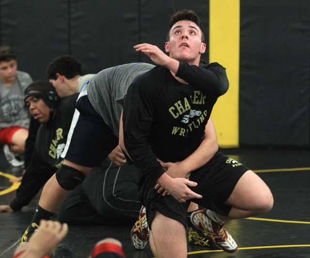 Clark wrestler Jacob Chaparian works out with Damian Garavito in practice on Tuesday. Chapar ...
