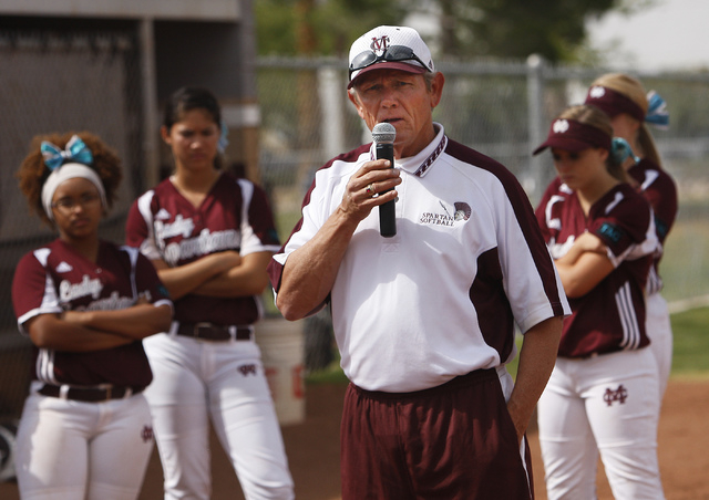Cimarron-Memorial softball coach Steve Gorden makes a speech during a ceremony honoring the ...
