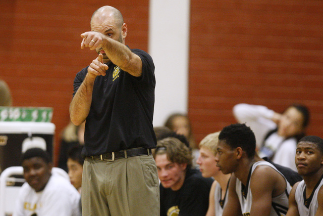 Clark head coach Chad Beeten positions his players during their game against Faith Lutheran ...