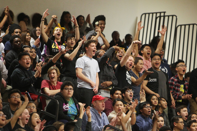 Clark fans cheer as the Chargers pull away from Faith Lutheran during their game Thursday, F ...