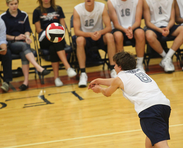 Legacy’s Trent Compton (8) digs the ball against Cimarron-Memorial on Tuesday. (Chase ...