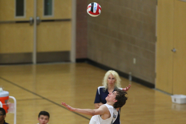 Legacy’s Trent Compton (8) looks to serve the ball against Cimarron-Memorial on Tuesda ...